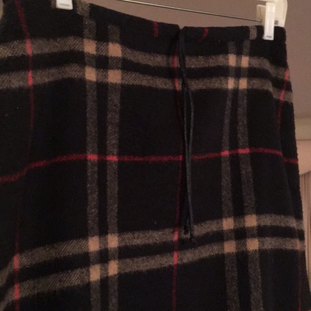 Long acrylic, poly/ wool plaid fully lined skirt.